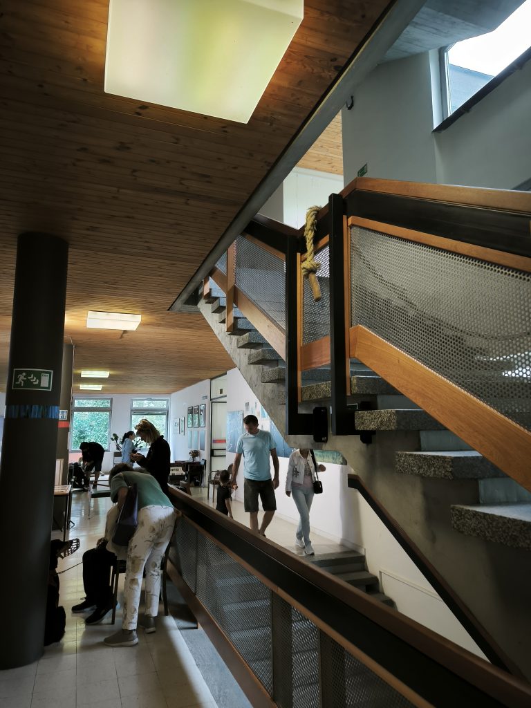 people walking at the hallway at the transformarte art fair in Eisenstadt 2025
